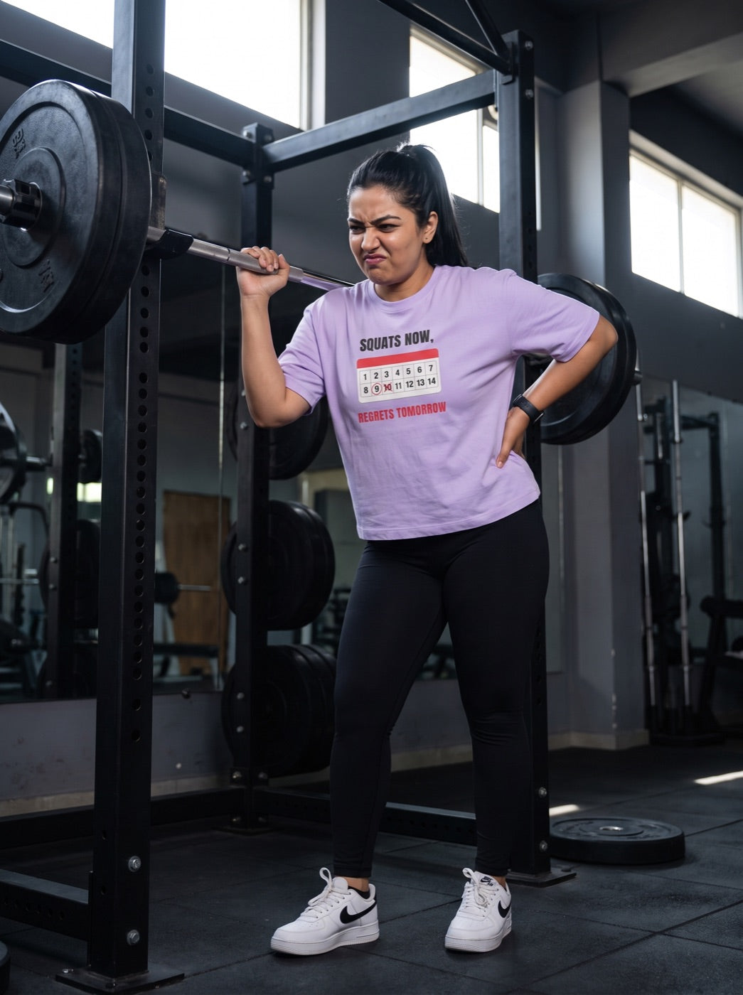 Squats and Regrets she lifts banner