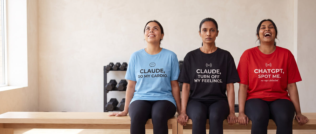 Hey Claude: three women on a gym bench in sky blue, black and red tees