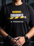 Dhamkee In Progress box fit gym t shirt for women in Black, close up of the front graphic print