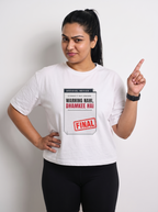 Warning Hai box fit gym t shirt for women in White, worn by a model giving a mock warning finger wag