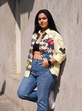 Talk Less oversized Kora cotton shirt in lemon yellow, worn open with a bralette and denim, sleeves rolled
