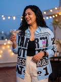 Breaking News oversized Kora cotton shirt in sky blue, worn open at a rooftop party at dusk