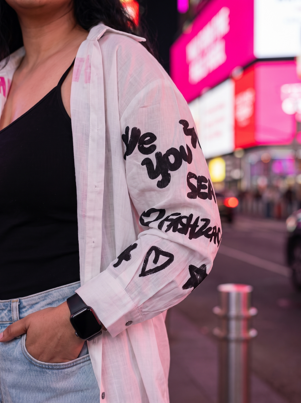 Sleeve detail of the Unforgettable oversized Kora cotton shirt showing the doodle print
