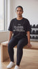 Claude, Turn Off My Feelings tee in black, worn on a gym bench